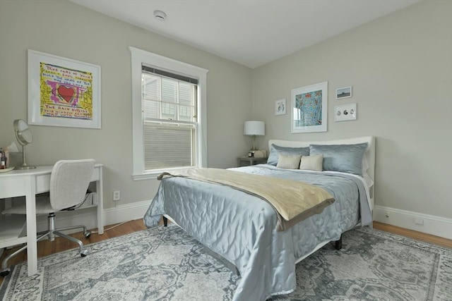 6 Brewer St Unit 2, Cambridge, MA 02138 - bedroom with wood finished floors and an office area