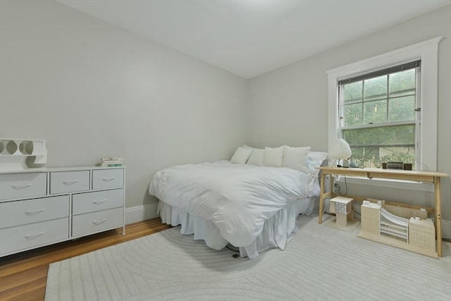 6 Brewer St Unit 2, Cambridge, MA 02138 - bedroom with wood finished floors and baseboards