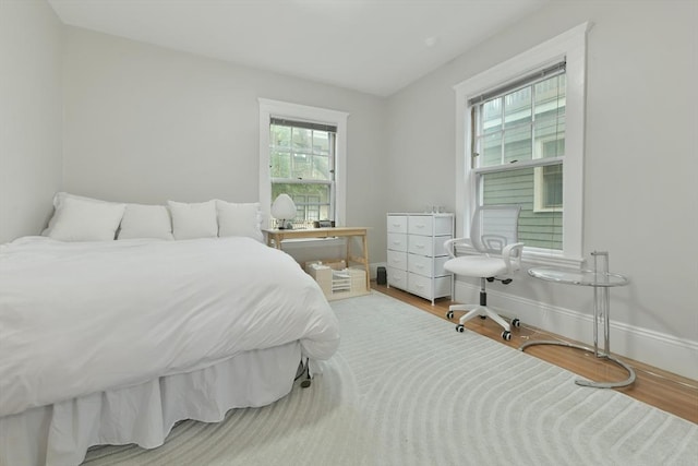 6 Brewer St Unit 2, Cambridge, MA 02138 - bedroom with wood finished floors and baseboards