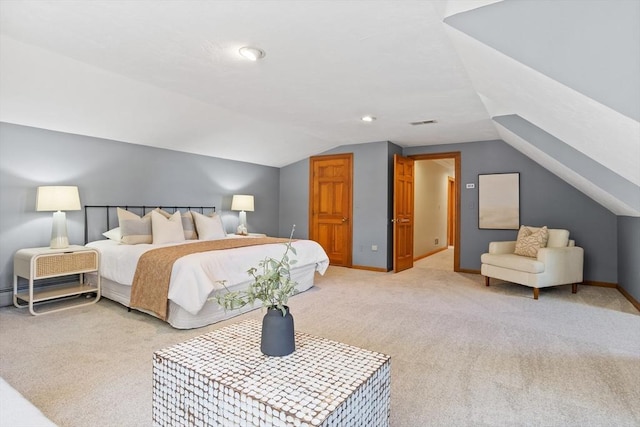 carpeted bedroom with baseboards, visible vents, and lofted ceiling