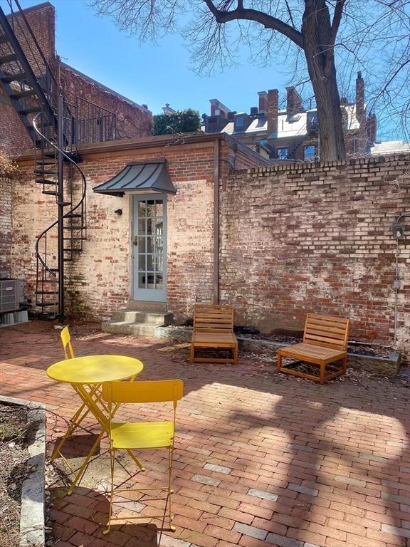 view of patio with central AC