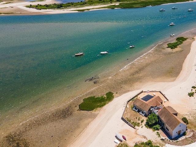 aerial view featuring a view of the beach and a water view