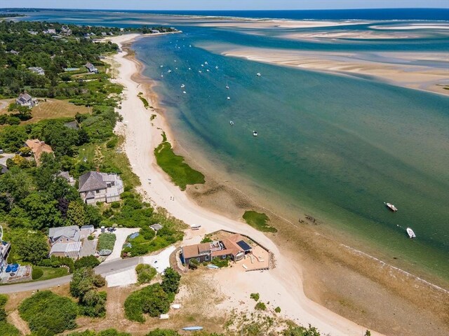 bird's eye view with a view of the beach and a water view