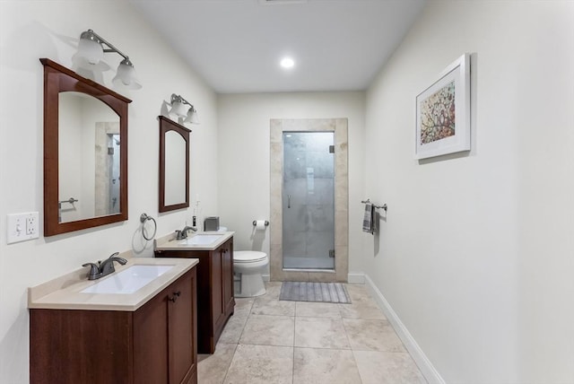 full bathroom featuring a stall shower, two vanities, toilet, tile patterned floors, and baseboards