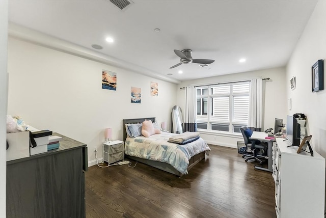 bedroom with an office area, dark wood-style flooring, recessed lighting, baseboards, and a ceiling fan