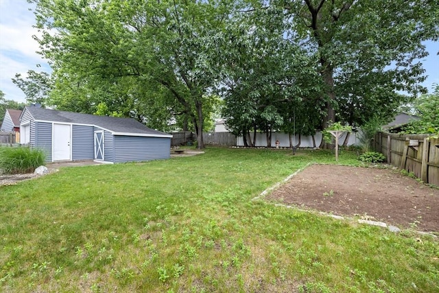 41 Yvette St, Chicopee, MA 01020 - fenced backyard with a storage shed