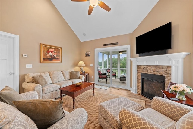 11 Soucy Dr Unit 11, Rutland, MA 01543 - living room with ceiling fan, high vaulted ceiling, light wood finished floors, and a fireplace