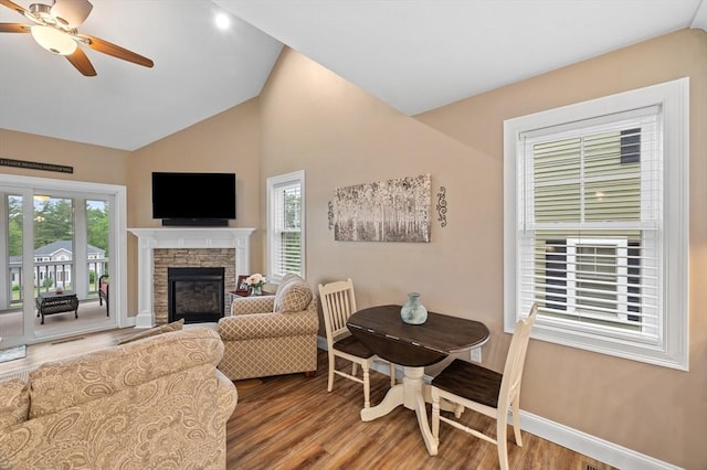11 Soucy Dr Unit 11, Rutland, MA 01543 - living area featuring a fireplace, wood finished floors, a ceiling fan, and high vaulted ceiling