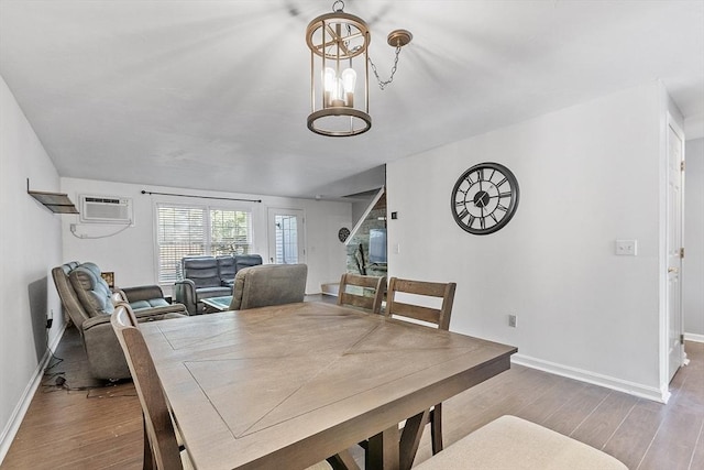13 Berrington Rd Unit 13, Leominster, MA 01453 - dining room featuring wood finished floors and a wall mounted AC