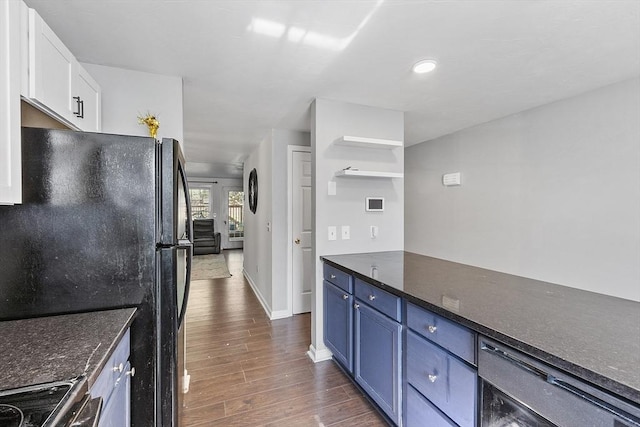 13 Berrington Rd Unit 13, Leominster, MA 01453 - kitchen with blue cabinets, dark wood-style flooring, freestanding refrigerator, white cabinetry, and open shelves