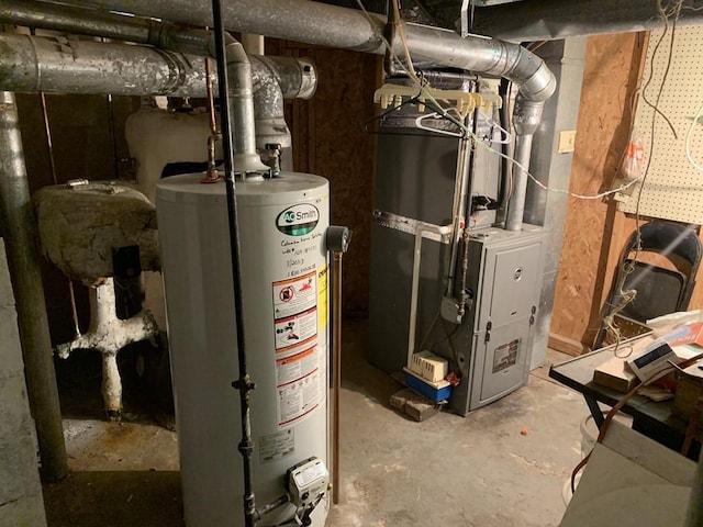 utility room featuring heating unit and water heater