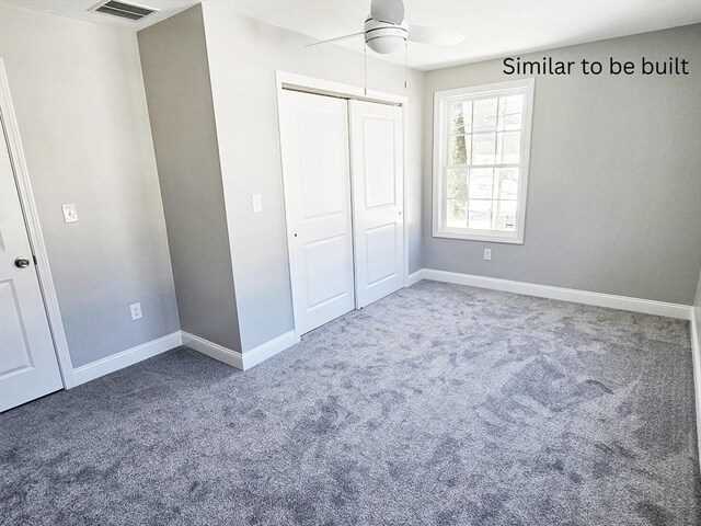 unfurnished bedroom with a closet, carpet, visible vents, and baseboards