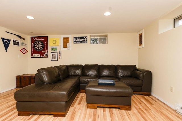 living room with light hardwood / wood-style flooring