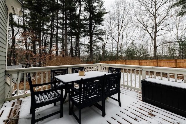 view of snow covered deck