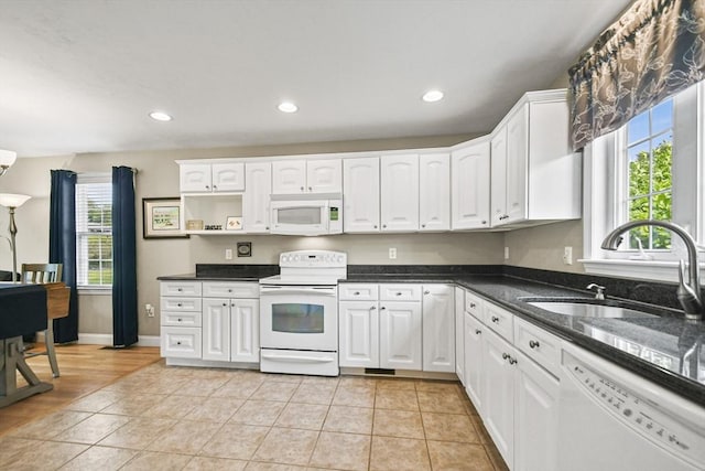7 Myra Ln Unit 11, Worcester, MA 01606 - kitchen featuring white appliances, a sink, healthy amount of natural light, white cabinetry, and recessed lighting