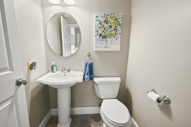 7 Myra Ln Unit 11, Worcester, MA 01606 - half bath with toilet, baseboards, and tile patterned flooring