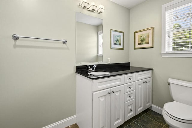 7 Myra Ln Unit 11, Worcester, MA 01606 - bathroom featuring toilet, vanity, baseboards, and tile patterned flooring
