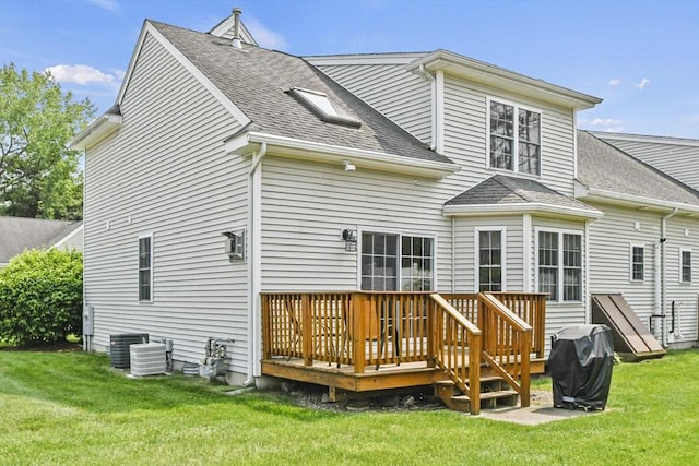 7 Myra Ln Unit 11, Worcester, MA 01606 - back of house featuring a deck, a shingled roof, a lawn, and central AC