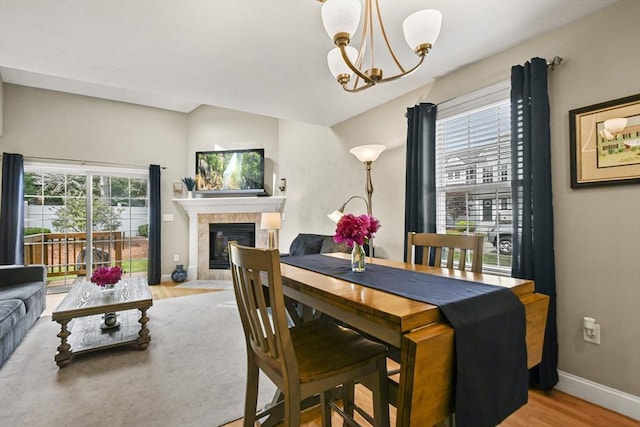 7 Myra Ln Unit 11, Worcester, MA 01606 - dining space featuring plenty of natural light, wood finished floors, a chandelier, and baseboards