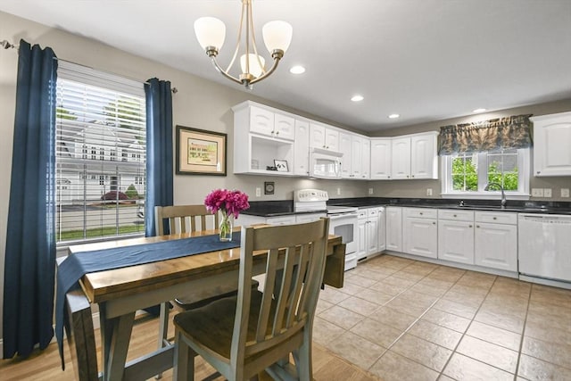 7 Myra Ln Unit 11, Worcester, MA 01606 - kitchen featuring white appliances, a sink, white cabinetry, dark countertops, and recessed lighting