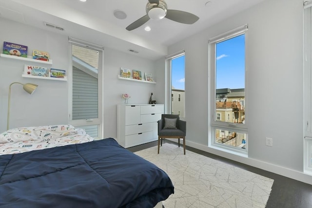 bedroom with ceiling fan, recessed lighting, visible vents, and baseboards