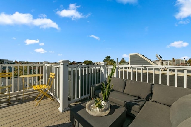 deck with an outdoor hangout area