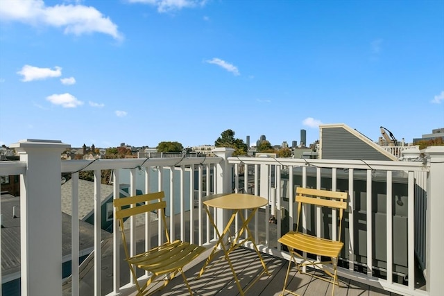 balcony featuring a city view