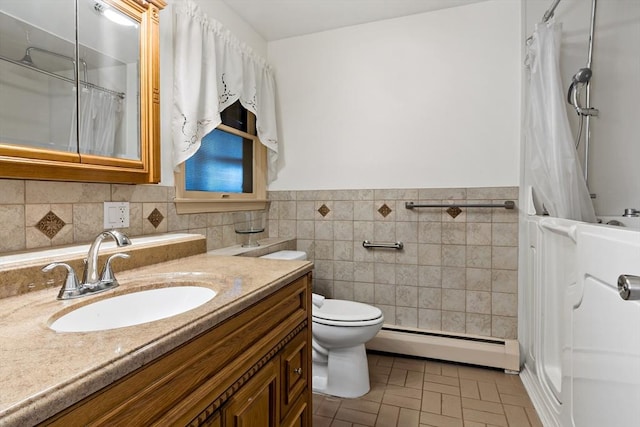 full bathroom with a baseboard heating unit, a wainscoted wall, toilet, vanity, and curtained shower