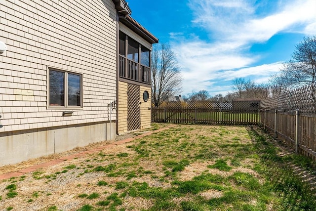 view of yard with a fenced backyard