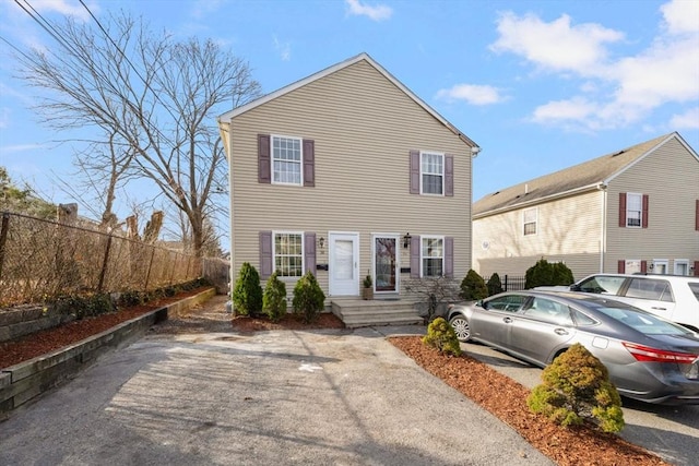 view of front of house with fence