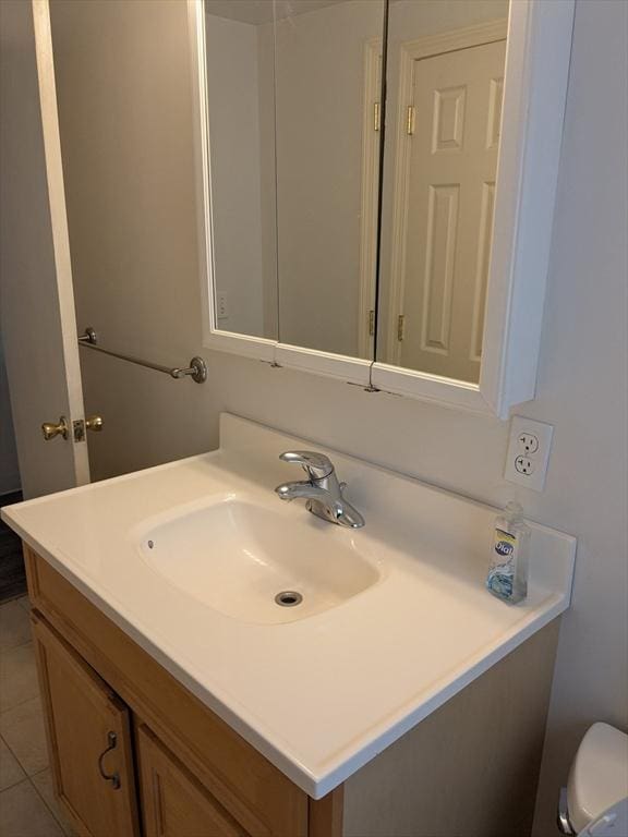 9 New Boston Rd, Dudley, MA 01571 - bathroom featuring vanity, toilet, and tile patterned flooring