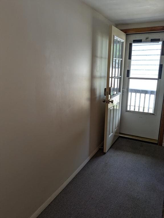 9 New Boston Rd, Dudley, MA 01571 - doorway featuring carpet flooring and baseboards