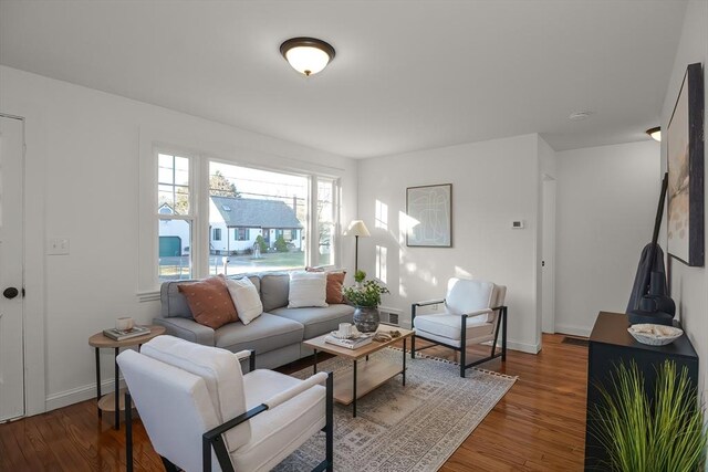 living room featuring dark hardwood / wood-style floors