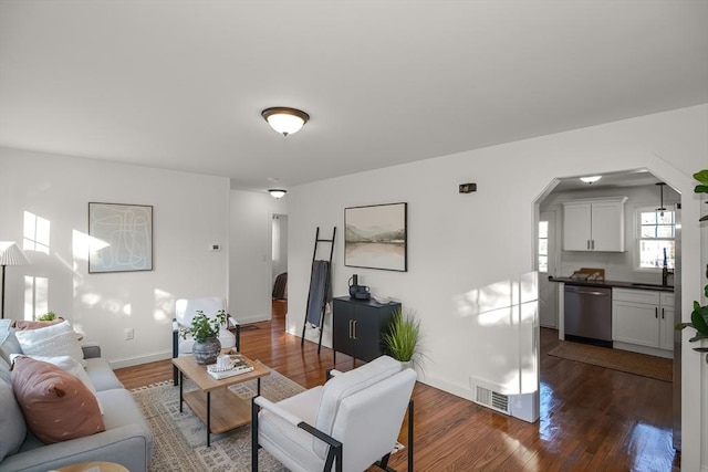 living room featuring dark hardwood / wood-style floors