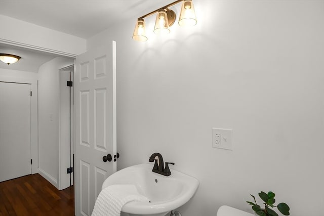 bathroom featuring hardwood / wood-style floors and sink