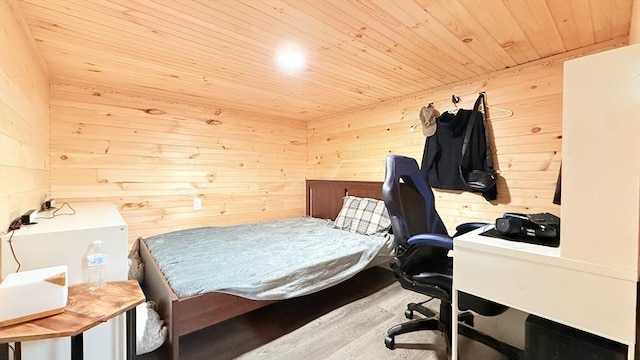 9 Willow Rd, Holbrook, MA 02343 - bedroom featuring wood ceiling, wooden walls, wood finished floors, and an office area