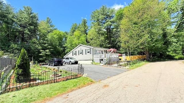 9 Willow Rd, Holbrook, MA 02343 - view of front of house with asphalt driveway