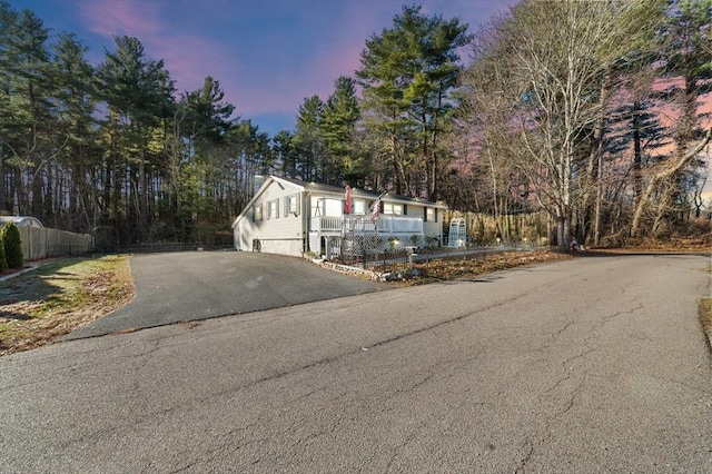 9 Willow Rd, Holbrook, MA 02343 - manufactured / mobile home with asphalt driveway and a garage