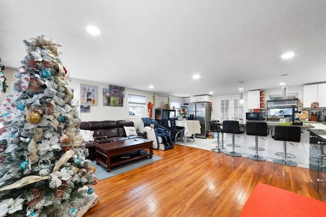 9 Willow Rd, Holbrook, MA 02343 - living area with light wood-style flooring and recessed lighting