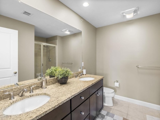 bathroom with walk in shower, tile patterned floors, toilet, and vanity