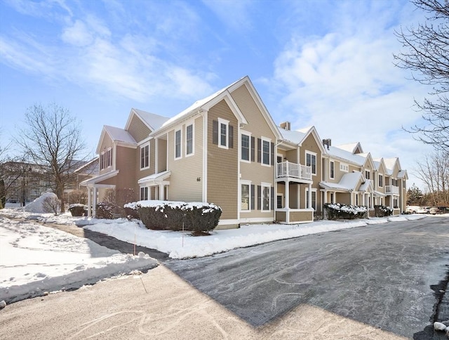 view of snow covered property