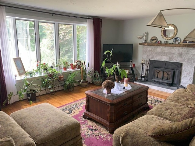 77 Westwood Pkwy, Southbridge, MA 01550 - living area with a fireplace and wood finished floors