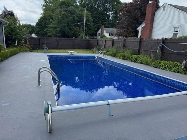 77 Westwood Pkwy, Southbridge, MA 01550 - view of swimming pool featuring a fenced backyard and a patio area