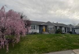 77 Westwood Pkwy, Southbridge, MA 01550 - single story home featuring a front lawn