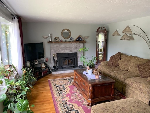 77 Westwood Pkwy, Southbridge, MA 01550 - living room with wood finished floors and a tile fireplace
