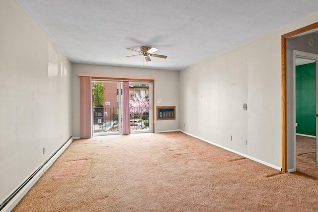 unfurnished living room with carpet, a ceiling fan, baseboards, heating unit, and a baseboard heating unit