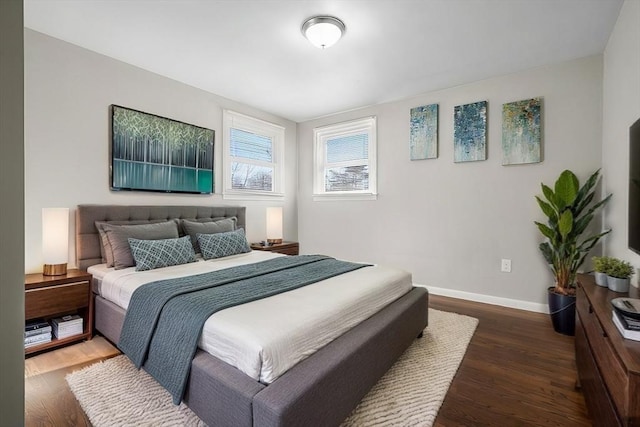 bedroom featuring dark hardwood / wood-style flooring