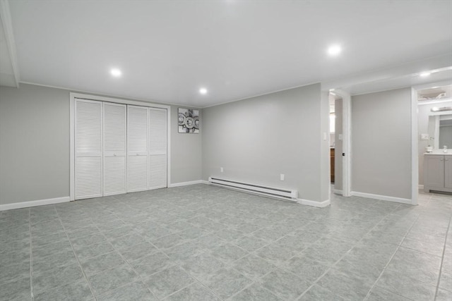 basement featuring a baseboard radiator