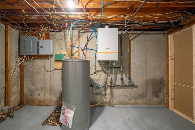 utilities with water heater, gas water heater, and electric panel