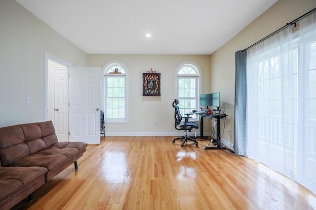 office area with baseboards, recessed lighting, and light wood-type flooring